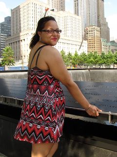 Doreen stands next to the North Tower fountain. The names of the victims of the September 11 attacks are inscribed on bronze plates ringing both fountains.