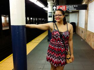 Doreen poses for a photo on the Lexington Avenue Line platform at Fulton Street.