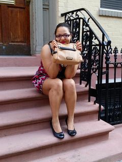 Doreen posed for a photo on the front stoop of one of the houses on Leroy Street.