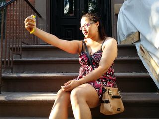 Doreen gets a selfie in front of the Cosby Show house. Afterwards, we realized that the background was not as she intended: rather than the house, she got the plastic sheeting covering the renovation work on the house next door. Wonder if, in the show's universe, this would have been Jeffrey Engels' house?