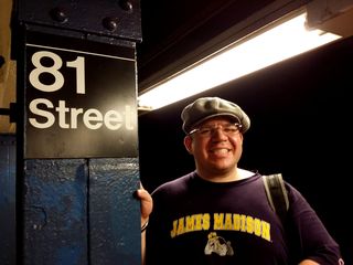 When we got to 81st Street, Doreen got a photo of me with one of the signs on the columns. Unlike DC Metro pylons, these are much easier to pose with.