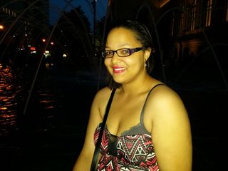 Doreen, sitting next to the fountain in front of the Met.