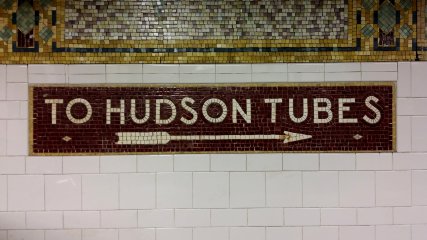 "TO HUDSON TUBES" sign on the wall at Cortlandt Street, directing passengers to the PATH trains.