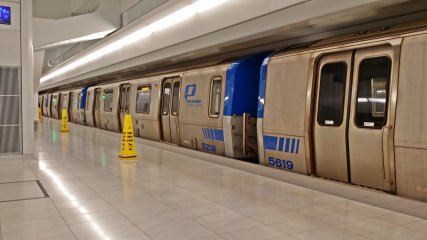 A train laid up on one of the tracks.