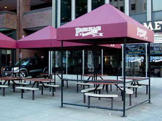 This is where we spent a few moments to get out of the rain, seen here in this June 6, 2006 file photo. We stayed under the double canopy in the back, and pushed the tables together to ensure that we stayed out of the rain.