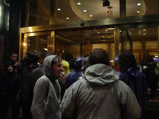 When some members of our group realized that we'd caught the hotel off guard, part of our black bloc marched directly into the hotel's lobby.