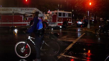 The fire truck leaves the station to respond to an emergency.