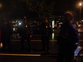 The police, meanwhile, stood guard not only at the hotel's entrance, but around the outside of our demonstration as well.