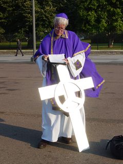 Meanwhile, David Barrows takes a moment to study his notes for the upcoming exorcism.