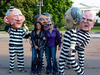 A number of people also took a moment to pose for photos with the people portraying Bush, Cheney, Rumsfeld, and Condoleezza Rice.
