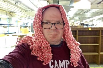 On February 27, after photographing the old Leesburg Walmart, Elyse and I found ourselves at the Habitat for Humanity store in Winchester, Virginia.  Here, I'm wearing a mop head on my head, and trying to hold it together for a serious-looking photo of me with long hair.  Clearly, I didn't succeed in keeping a straight face, but at least I get an "A" for effort, right?