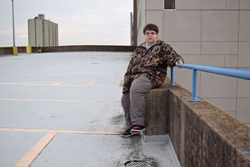 Elyse poses for a photo on the roof of a parking garage in downtown Harrisburg.