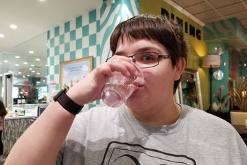 On March 3, we went around Rockville.  Here, at Bob's Discount Furniture, Elyse and I each had a glass of water.