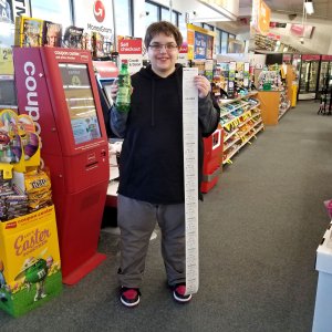 On March 4, prior to going up to Baltimore, we stopped at the CVS store near the house so that Elyse could get a drink.  Here, Elyse shows off the receipt that is nearly as tall as she is, which she got for a single bottle of ginger ale.