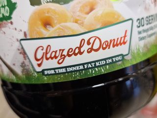 A container of protein powder that Elyse found at GNC.  With the way that they wrote "Glazed Donut", you would never be able to guess who they were talking about without actually naming them...