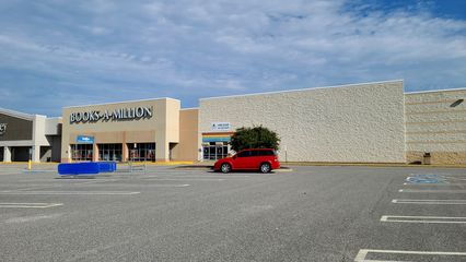 The former Toys "R" Us turned out not to be a conversion.  I thought that the Books-A-Million store used part of the former Toys "R" Us building, but according to Google Maps, the Toys "R" Us always looked like this, and the Books-A-Million store predated the closure of the Toys "R" Us.