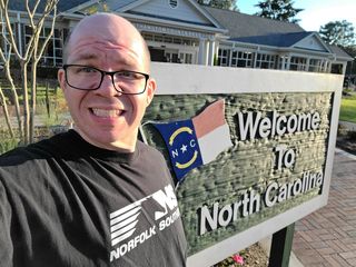 Selfie in front of the North Carolina sign.