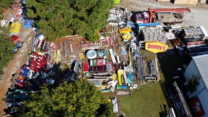 The grounds of Reese Sign Services contained the signs for many well-known brands, including McDonald's, Michaels, Sherwin-Williams, Quality Inn, and a whole host of other national and regional companies.