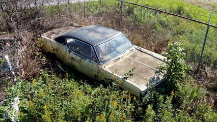 A yellow AMC Matador.