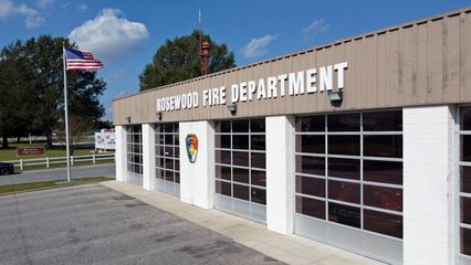 Rosewood Fire Department building, with the siren mounted on the roof.