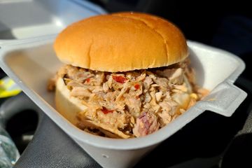 My lunch, minus the bun, which I set aside.  Gotta love some good Carolina-style barbecue.