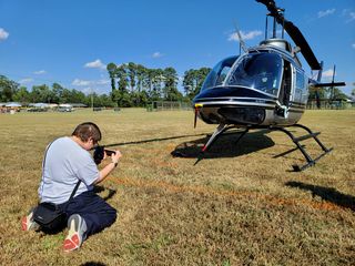 Elyse photographs the helicopter.