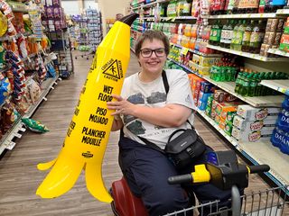 Elyse poses for a photo with the banana cone.