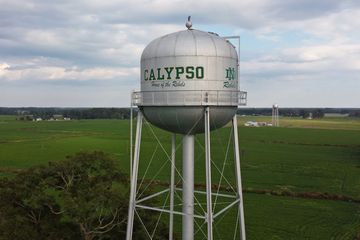 The water tower near the fire department in Calypso.  The water tower is marked with the mascot of the local high school, North Duplin Junior-Senior High School, the Rebels.  The logo is a palette swap on the logo for the University of Notre Dame.