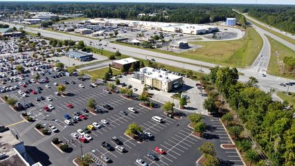 The east side of the Rivertowne Square shopping center (the one that has the Walmart), facing northwest, looking towards the mall.