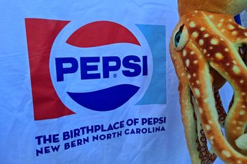 A shirt that we bought at the Birthplace of Pepsi-Cola.  Woomy inspected it, and, unsurprisingly, he took issue with it.