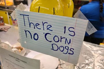 Sign in the window of a food vendor: "There is no corn dogs".