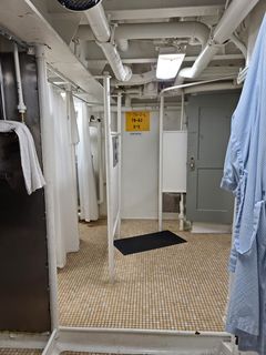 Shower room.  Note that the toilet is disconnected and covered.  Working restrooms were provided elsewhere.