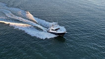 I followed a small powerboat for a little while, getting a few aerials of it from various angles.