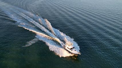 I followed a small powerboat for a little while, getting a few aerials of it from various angles.