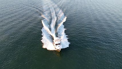 I followed a small powerboat for a little while, getting a few aerials of it from various angles.