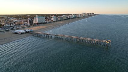 Another view up the beach, from well beyond the fishing pier.