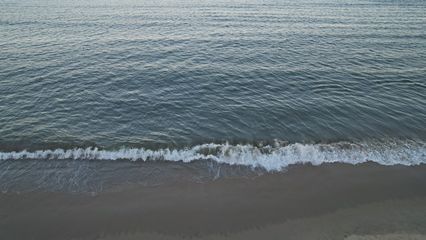 A quick shot of the waves breaking on the beach.