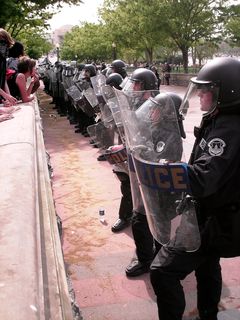 Police officers in full riot gear lined the walkway making sure that we did not interfere with the Nazis' rally, and bike cops took up positions on the other side of us.