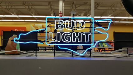 Neon "Bud Light" sign with the outline of North Carolina on it in the beer aisle, along with a bunch of others advertising various brands.  Walmart stores in Maryland don't sell alcohol, and Virginia stores don't have this sort of display, so this was certainly a novelty.  I can't say that I'm jealous, either, as I've always thought that neon beer signs were tacky.