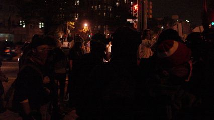 By the appointed time, a crowd had assembled in Washington Circle, most dressed in full black bloc.