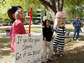 Meanwhile, it seems the whole crowd was here, with David Barrows in his "devil Bush" outfit, as well as people in the Condoleezza Rice and Dick Cheney heads with the prison stripes.