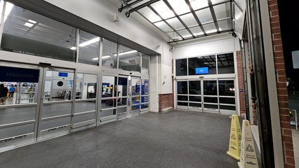 The Walmart in Watertown was a typical mid 2000s conversion Supercenter, i.e. a store that began as a non-Supercenter Walmart and was later expanded to the Supercenter format.  However, I was surprised to see a second, outer vestibule on this building.