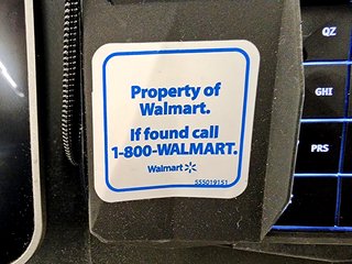 "Property of Walmart" sticker on the pin pad, which was a first for us as well.