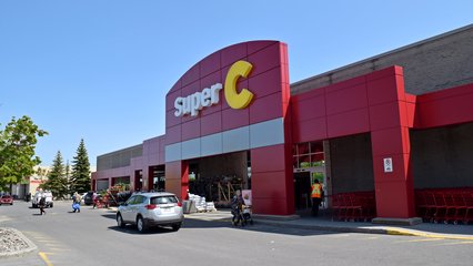 Super C, a Quebec-based discount supermarket chain.  Unfortunately, due to time considerations, I was not able to check this out beyond just photographing the front of it.  Based on the architecture, I initially thought it was a former Kmart (and then possibly Zellers), but upon doing some research, I don't believe that it ever was.