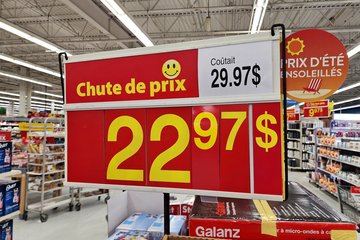Red and yellow price signage, which is typical for Canadian Walmart stores.  Note that the dollar sign appears after the price.  This is the normal convention in French-speaking Canada.