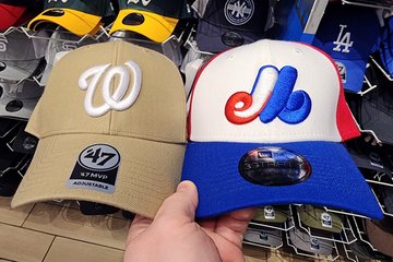 Washington Nationals and Montreal Expos hats at Lids.  Considering how long it has been since the Expos left Montreal for Washington, I was wondering if there would still be Expos merchandise for sale.  This answered my question, and I suspect that they will never stop selling Expos merchandise in Canada.