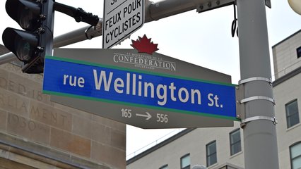 Presumably owing to its place as the national capital as well as its proximity to Quebec, street signs in Ottawa are bilingual.