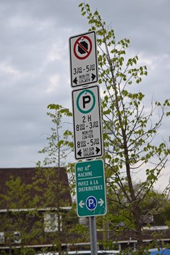 Parking sign along Montreal Road.