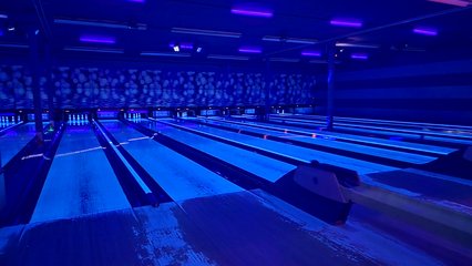 West Park Bowling, lit up for cosmic night.