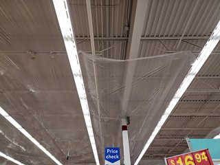 What I found strange about this location, though, was the amount of plastic up in the ceiling.  A large portion of the store had plastic spread out in the ceiling.  Was there some sort of roof issue going on?  I never found out.
